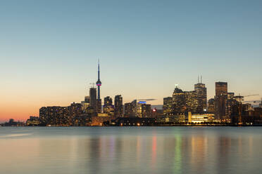 Canada, Ontario, Toronto, Skyline of lakeshore city at dusk - WPEF05708