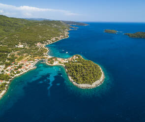 Aerial view of Prizba peninsula facing the Adriatic Sea along the coast in Croatia. - AAEF13851