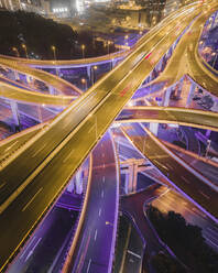 Aerial view of Yan An elevated road in Shanghai at night, China. - AAEF13925