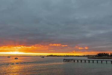 Australia, South Australia, Robe, Cloudy sky over Robe Jetty at sunset - FOF12732