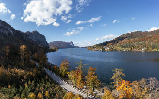 Empty road amidst Mondsee lake and forest, Salzkammergut, Upper Austria, Austria - WWF06034