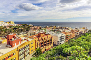 Residential buildings by sea at La Palma, Santa Cruz, Canary Islands, Spain - THAF03031