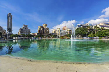 Pond by modern buildings in city, Tenerife, Canary Islands, Spain - THAF03036