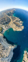 Aerial panoramic view of cliffs surrounding the beach of Matala seaside town, Crete, Greek Islands, Greece, Europe - RHPLF21248