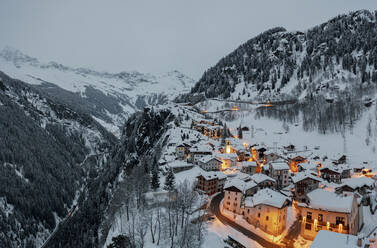 Small village of Pianazzo on top of snowcapped mountain after a snowfall, Madesimo, Valle Spluga, Valtellina, Lombardy, Italy, Europe - RHPLF21272