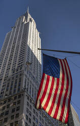 The Chrysler Building and United States Stars and Stripes flag, Manhattan, New York City, New York, United States of America, North America - RHPLF21391