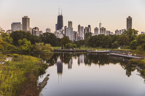 Reflection of cityscape on lake water Chicago, USA - WPEF05792