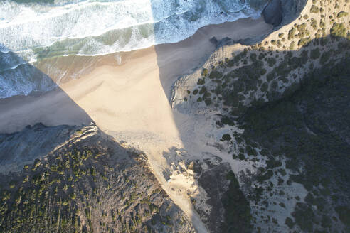 Portugal, Algarve, Vila do Bispo, Aerial view of Praia dos Mouranitos beach at dawn - MKLF00041