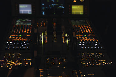 Push buttons on control panel in illuminated cockpit - PNAF03243