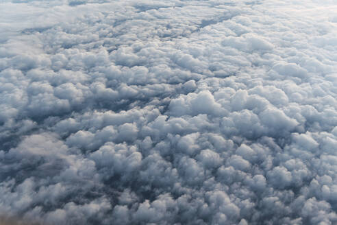 Airplane view of cloudy sky - PNAF03247