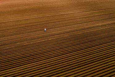 Farmer at arable agricultural field - NOF00442