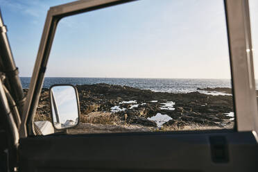 Sea view seen through car window - SSCF00984