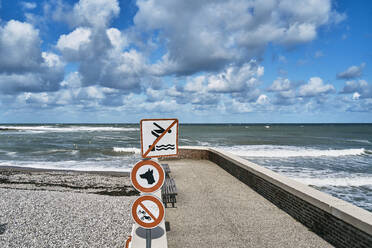Forbidden sign boards on jetty by sea - SSCF01040