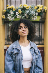 Thoughtful woman with denim jacket - DGOF02322