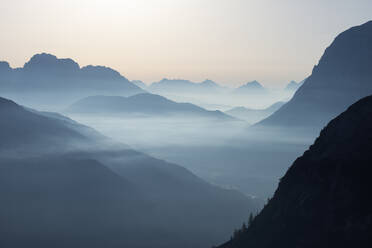 Dolomites shrouded in morning fog - RUEF03535