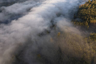 Aerial view of Bleiloch Reservoir shrouded in thick morning fog - RUEF03553