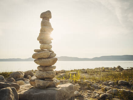 Stack of stones by lake - TETF00259