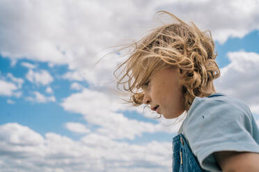Portrait of little boy against the blue sky - CAVF95582