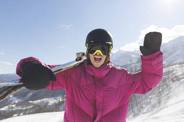 Cheerful man with mouth open in winter - OMIF00718