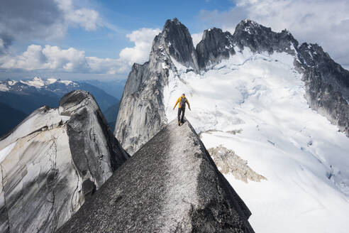 Man mountain climbing in Bugaboo Provincial Park, British Columbia, Canada - TETF00642