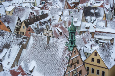Germany, Rothenberg au Tauber, Roofs of old town buildings in snow - TETF00896
