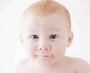 Studio shot portrait of surprised baby boy (18-23 months) - TETF01033