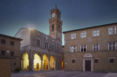 Italy, Tuscany, Val D'Orcia, Pienza, Municipal palace illuminated at night - TETF01316