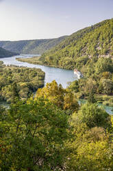 Scenic view of river amidst Krka National Park, Sibenik-Knin, Croatia - MAMF02024