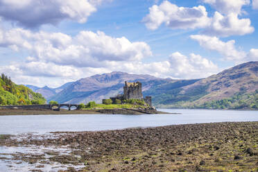 Scenic view of Eilean Donan castle on sunny day - SMAF02130