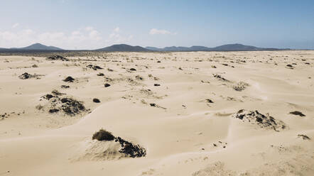Spain, Fuerteventura Aerial view of sandy landscape of Corralejo Natural Park - SIPF02819