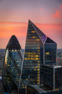 The Gherkin and Scalpel buildings in the City of London at dusk, London, England, United Kingdom, Europe - RHPLF21943