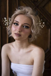 Beautiful young woman with blond hair and make-up - SSGF00646