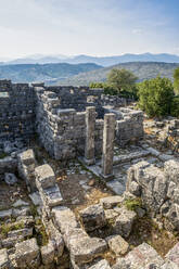 Ruined stone structures at archaeological site of Orraon, Arta, Greece - MAMF02173