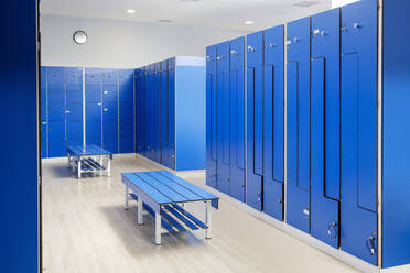 Empty blue locker room at gym - IFRF01603