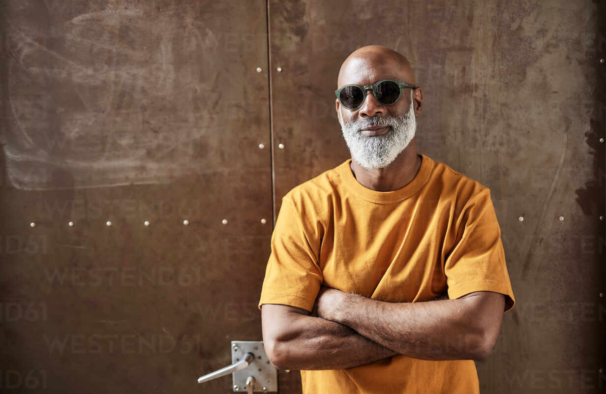 Portrait of a Stylish Bald Man with Trendy Sunglasses in Vintage Leather  Jacket Stands Near Black Car in Woods Outdoors. Stock Photo - Image of  automobile, modern: 245281378