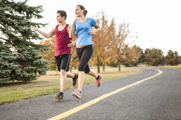 Young adults working out together - CAVF96300