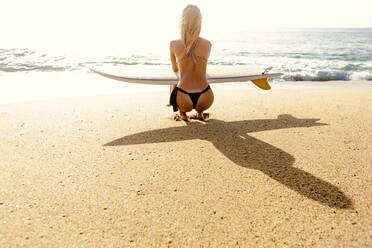 Surfer girl checking out the waves - CAVF96338