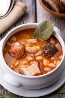 Top view of fabada asturiana, typical spanish bean stew with pork meat - CAVF96537