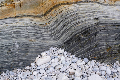 Pebble stones on eroded sandstone at Silence beach - MMPF00041