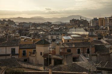 Spain, Mallorca, Maria de la Salut, Tiled roofs of old town houses - JMF00612