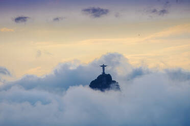 The Christ Statue (Cristo Redentor) on the summit of Corcovado mountain in a sea of clouds, Rio de Janeiro, Brazil, South America - RHPLF22018