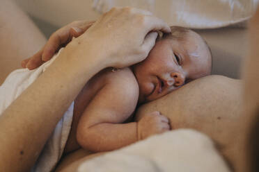 Mother with son in bathroom at home - MFF09096