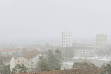 Buildings in city against sky during winter - MASF30319