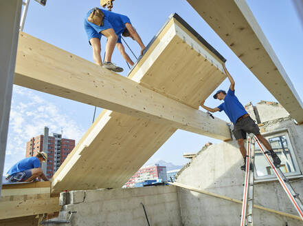 Construction worker working at site on sunny day - CVF01963