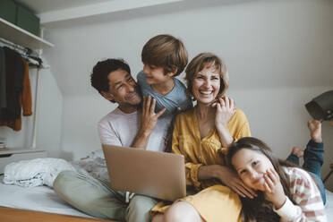 Happy family having fun at home - JOSEF10360