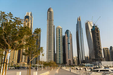 United Arab Emirates, Dubai, Dubai Marina with tall skyscrapers in background - TAMF03431