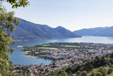 Switzerland, Ticino, Locarno, Edge of city located on northern shore of Lake Maggiore in summer - GWF07459