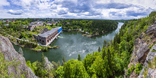 Sweden, Vastra Gotaland County, Trollhattan, Panoramic view of Gota Alv river and Olidan Power Plant - STSF03263