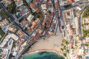 Aerial view of Carvoeiro township, a famous travel destination along the Ocean in the Algarve region, Carvoeiro, Portugal. - AAEF14789