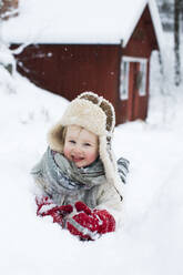 Girl playing in snow - FOLF11539